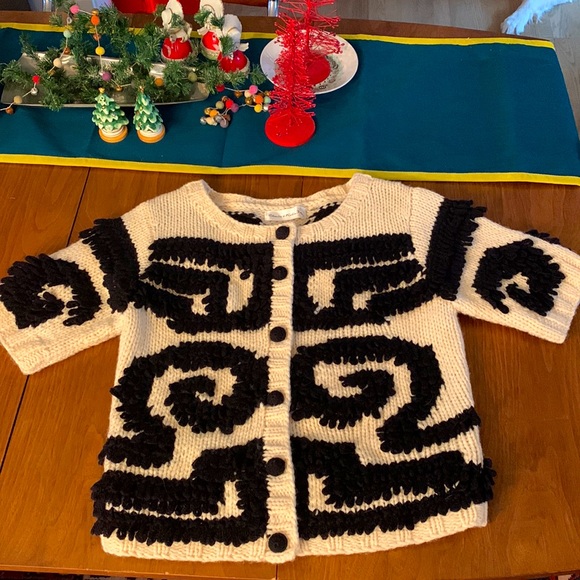 Charlie and Robin Sweaters - Cute short sleeve wool cardigan from Anthropologie.